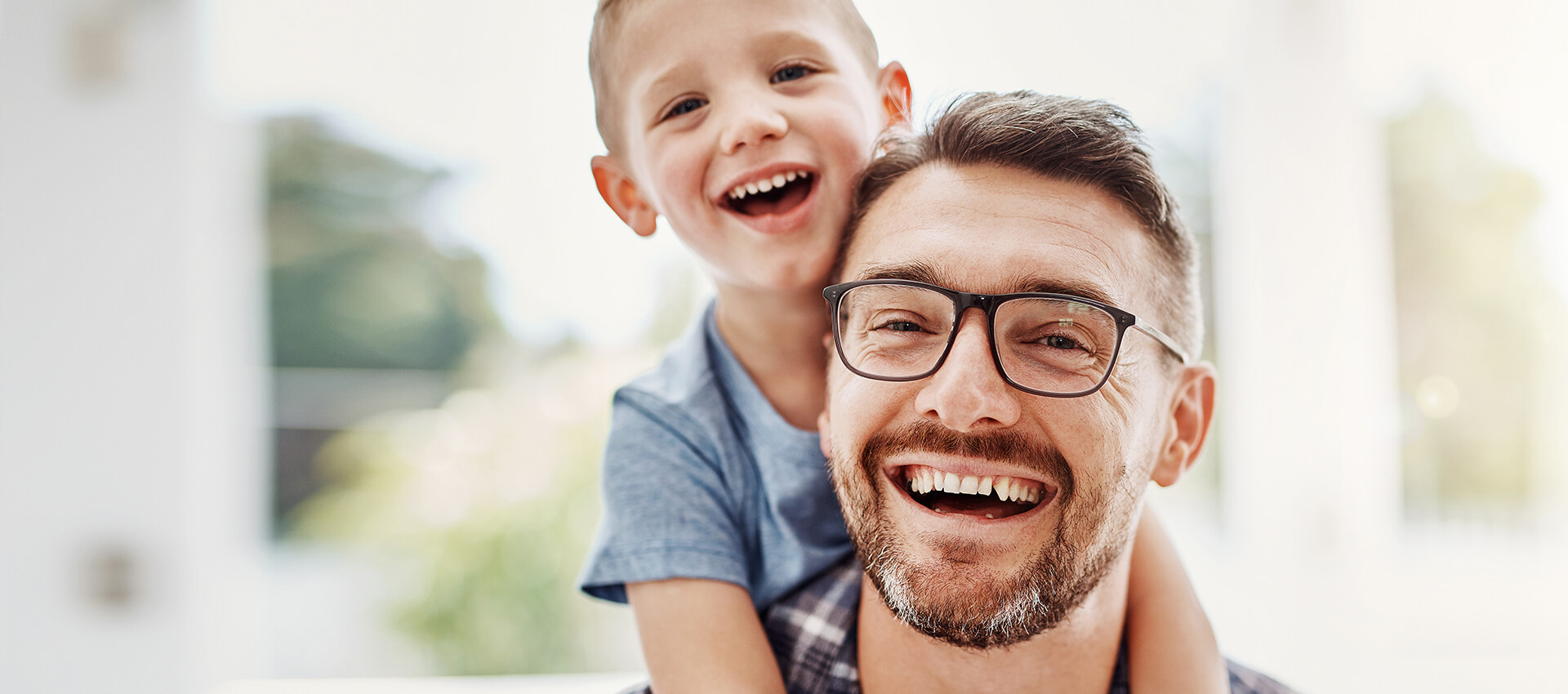 smiling-man-with-son